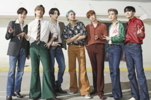 BTS GOES RETRO WITH GUCCI AND SAINT LAURENT PIECES IN LATEST VIDEO FOR "DYNAMITE"